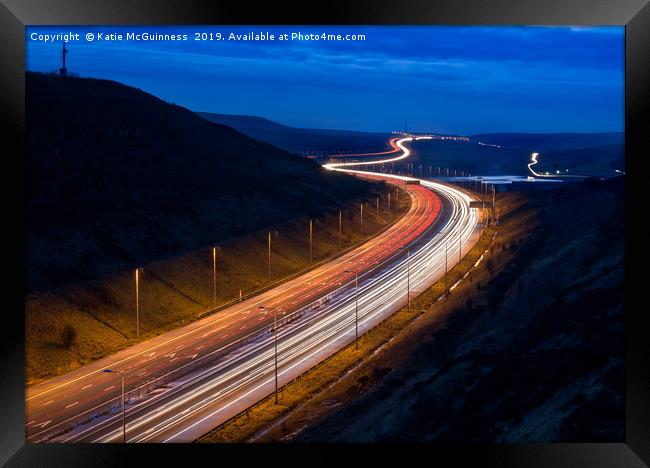 M62 light trails across the Penines in West Yorksh Framed Print by Katie McGuinness
