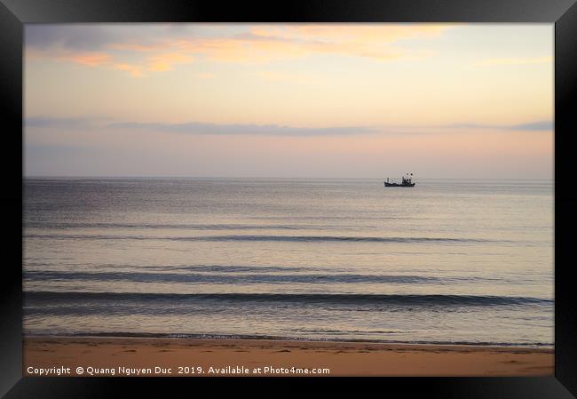 Boat alone in sandy beach Framed Print by Quang Nguyen Duc
