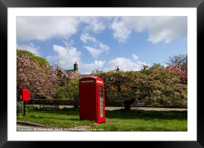 Small Rural Post Box Next to a Red Phone Box. Framed Mounted Print by Steven Gill