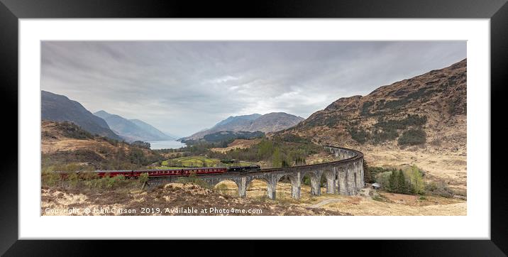 The Majestic Jacobite Train Crossing the Iconic Gl Framed Mounted Print by John Carson
