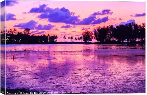 Sunset over a lagoon,  Canvas Print by Kevin Hellon