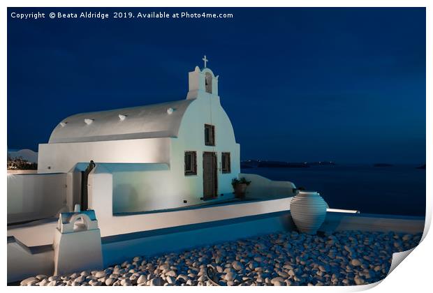 Whitewashed church in Oia at dusk. Print by Beata Aldridge