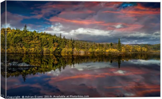 Lake Bodgynydd Sunset Canvas Print by Adrian Evans
