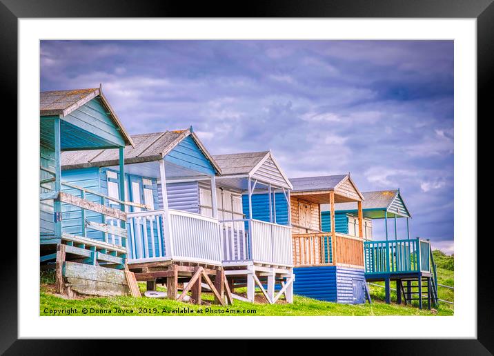 Colourful beach huts at Tankerton, Kent Framed Mounted Print by Donna Joyce