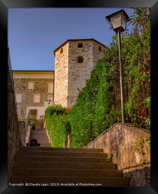 The tower is the apse of S.Mary church in S.Daniel Framed Print by Claudio Lepri