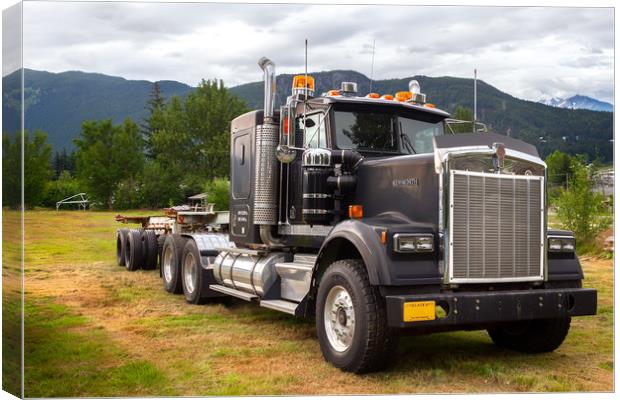 A Truck Kenworth W900 parked on a field over mount Canvas Print by RUBEN RAMOS