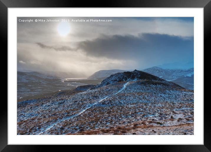 Snow showers over Loch Muick Framed Mounted Print by Mike Johnston