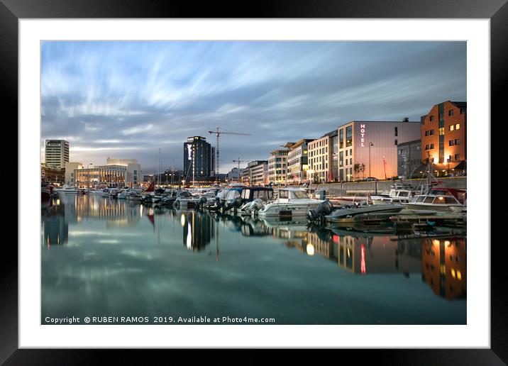 City and coastline of Bodo at evening, Norway. Framed Mounted Print by RUBEN RAMOS