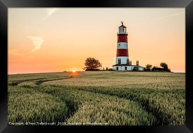 Happisburgh Lighthouse Sunset Over Field Framed Print by Neal Trafankowski