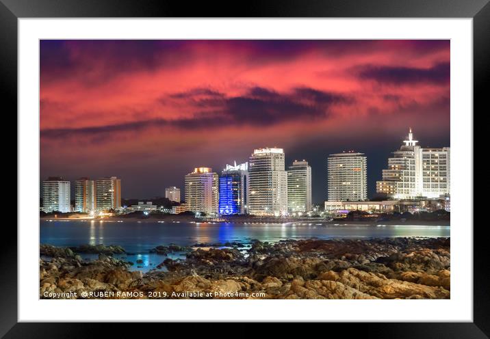 The City of Punta Del Este at night, Uruguay. Framed Mounted Print by RUBEN RAMOS