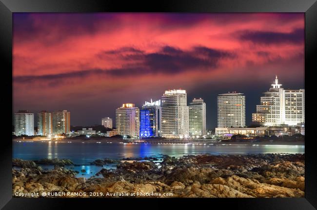 The City of Punta Del Este at night, Uruguay. Framed Print by RUBEN RAMOS