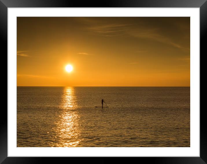 sunset paddle boarder at Westward Ho  Framed Mounted Print by Tony Twyman