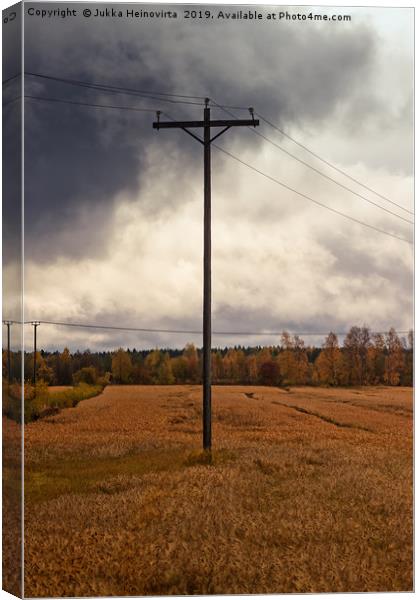 Telephone Pole Under The Heavy Clouds Canvas Print by Jukka Heinovirta