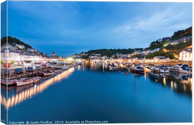 Looe harbour and the river, at night Canvas Print by Justin Foulkes