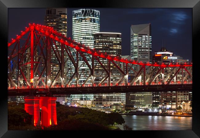 Story Bridge lit after dark, Brisbane. Framed Print by Andrew Michael