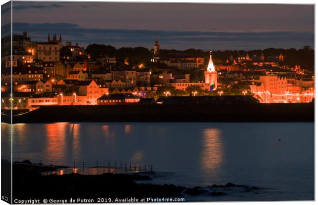 Night time over St Peter Port in Guernsey  Canvas Print by George de Putron