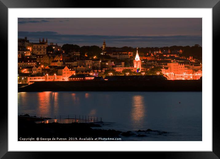 Night time over St Peter Port in Guernsey  Framed Mounted Print by George de Putron