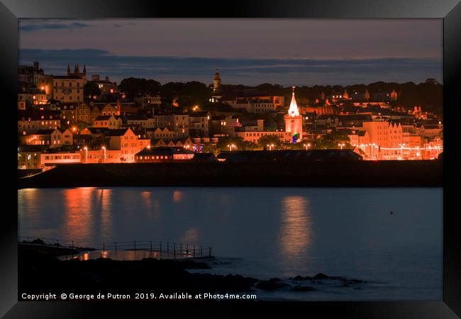 Night time over St Peter Port in Guernsey  Framed Print by George de Putron
