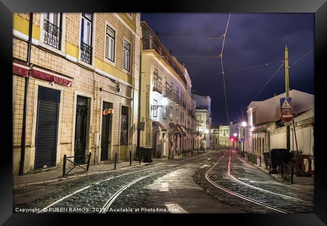 An old stone street in Lisbon at night. Framed Print by RUBEN RAMOS