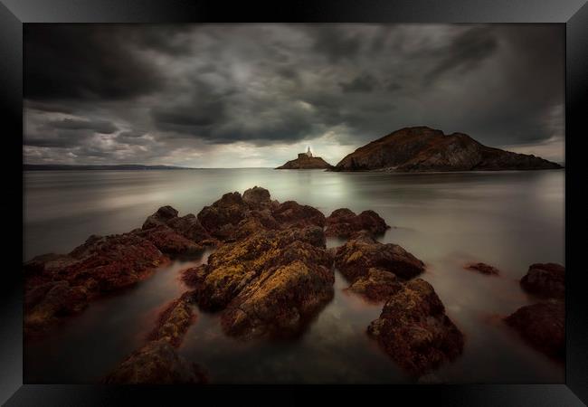 Storm clouds over Mumbles lighthouse Framed Print by Leighton Collins