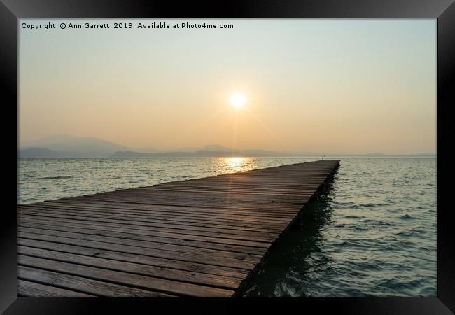Sunrise on Lake Garda Framed Print by Ann Garrett