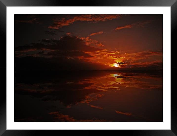 Sunset over water Framed Mounted Print by Richie Fairlamb