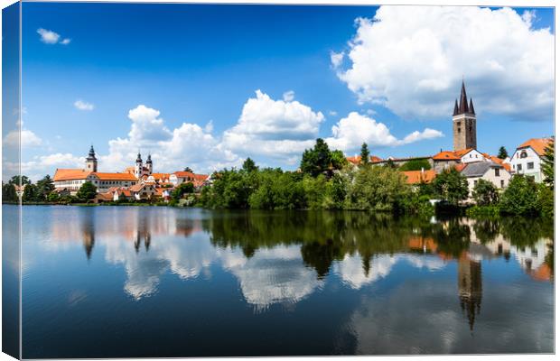 View of Telc across pond with reflections, Unesco  Canvas Print by Sergey Fedoskin