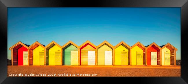 Colours of Coastal Joy Framed Print by John Carson