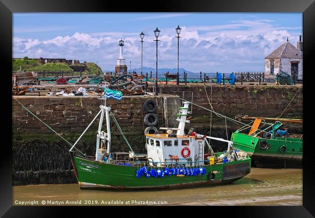 Maryport Harbour and lighthouse Framed Print by Martyn Arnold