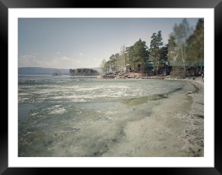 Spring landscape with ice drift on the lake.  Framed Mounted Print by Larisa Siverina