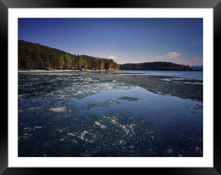 Spring landscape with ice drift on the lake.   Framed Mounted Print by Larisa Siverina