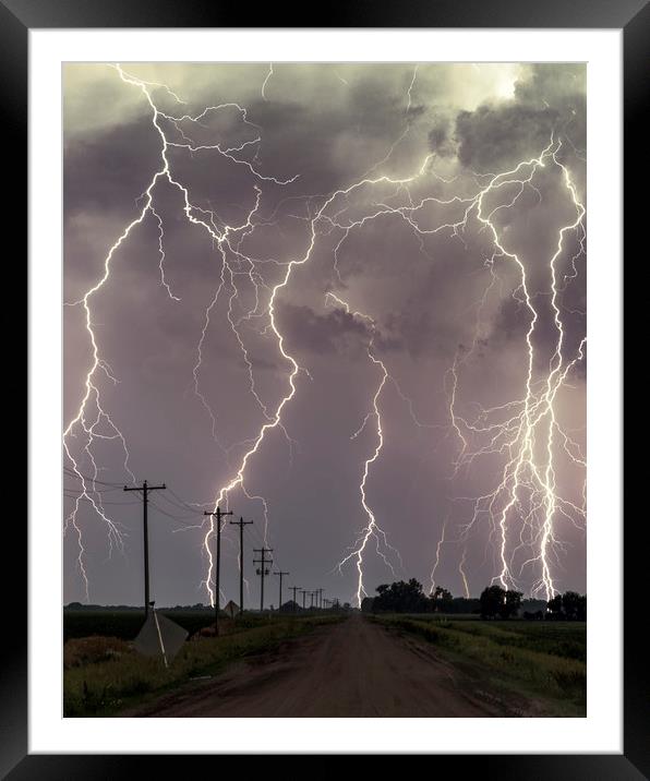 Lightning storm over Nebraska. Framed Mounted Print by John Finney