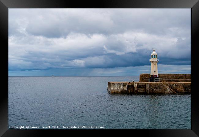Lonely Yacht Off Mevagissey Lighthouse Framed Print by James Lavott