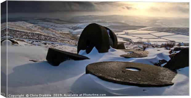 Abandoned Millstones at Stanage Edge in Winter Canvas Print by Chris Drabble