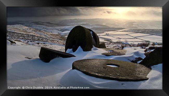 Abandoned Millstones at Stanage Edge in Winter Framed Print by Chris Drabble