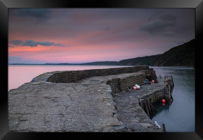 sunset at the harbour wall of Clovelly in Devon Framed Print by Tony Twyman