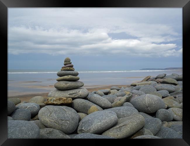 Holistic stone stack at Westward Ho in Devon Framed Print by Tony Twyman