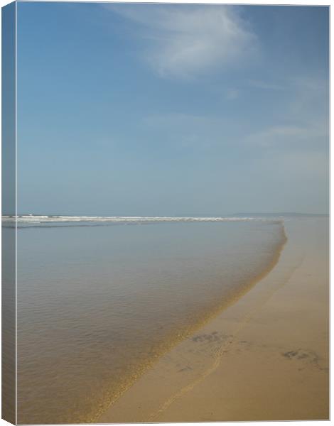 Calm and gentle waves at Westward Ho in Devon Canvas Print by Tony Twyman