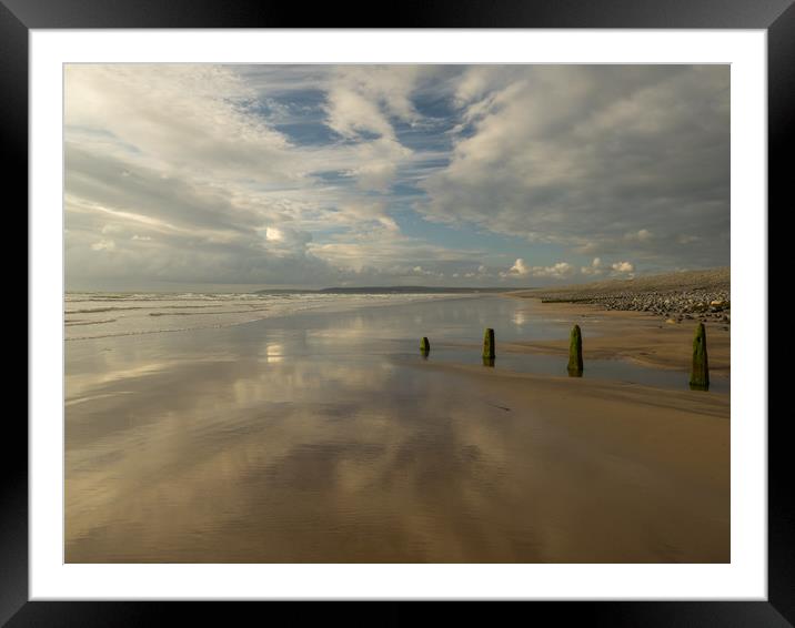 Groynes leading out to sea on Westward Ho! beach Framed Mounted Print by Tony Twyman