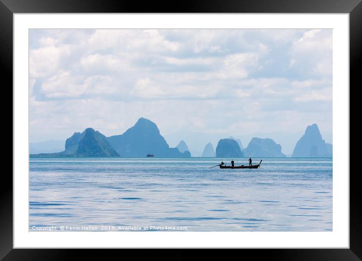Two men in a boat fishing Framed Mounted Print by Kevin Hellon