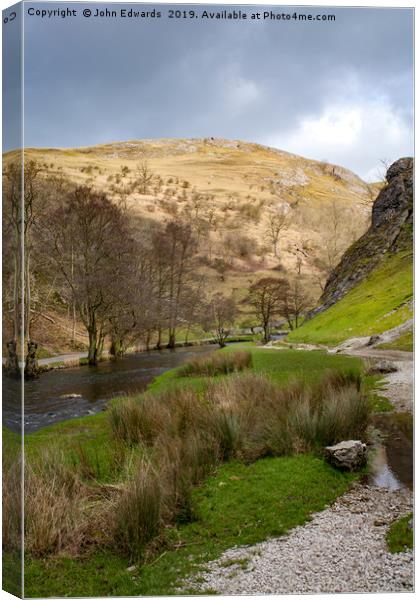 Dovedale and River Dove Canvas Print by John Edwards