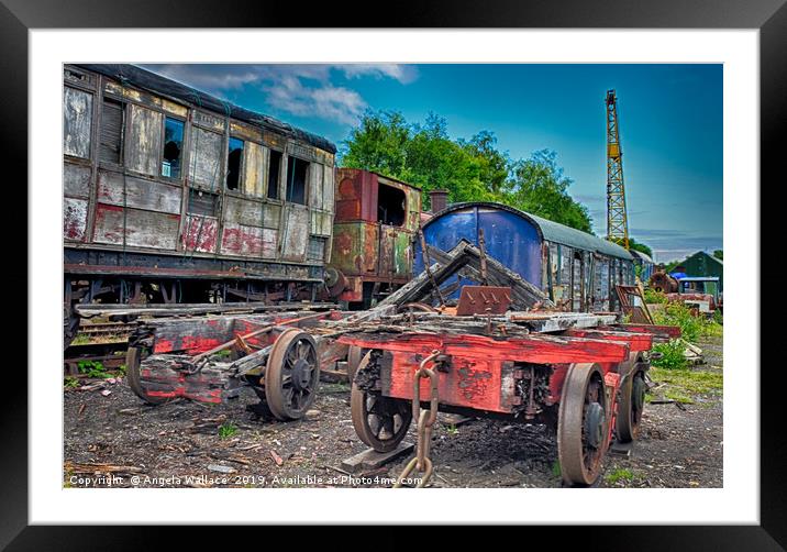 The Train Graveyard Framed Mounted Print by Angela Wallace