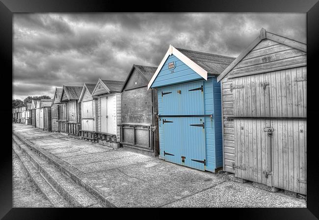 Beach Hut in isolation Framed Print by Chris Day