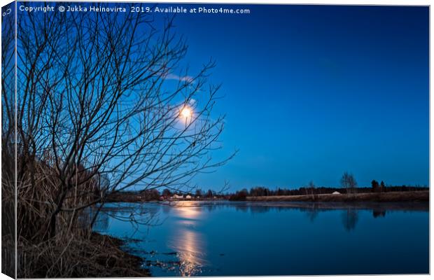 Full Moon Over The River Canvas Print by Jukka Heinovirta