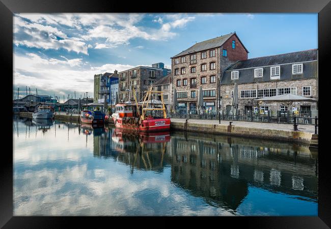 Fishing boats moored at Sutton harbour Framed Print by Andrew Michael
