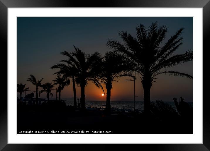 Sun setting in Crete Framed Mounted Print by Kevin Clelland