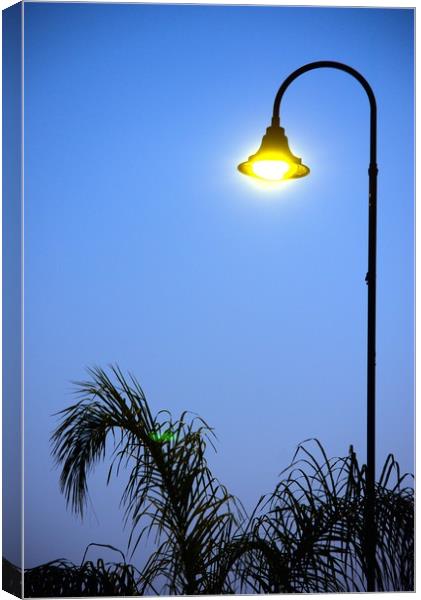 This is a street light at dusk. This is s popular  Canvas Print by Jose Manuel Espigares Garc