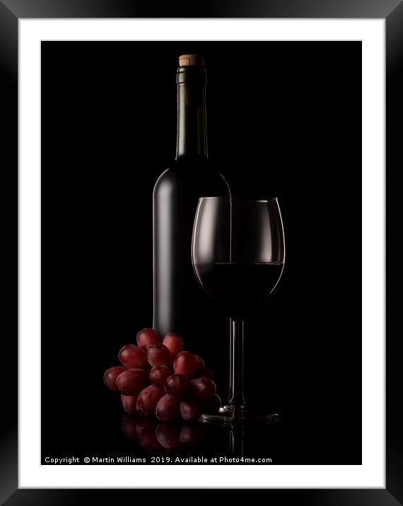 Wine bottle, glass and grapes Framed Mounted Print by Martin Williams