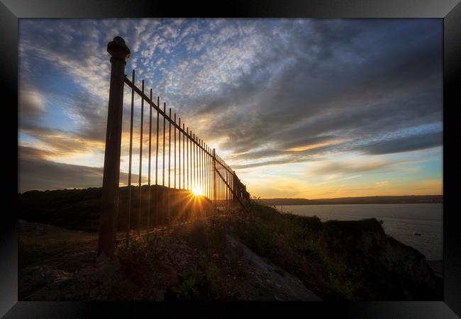 Safety railings and sunset Framed Print by Leighton Collins