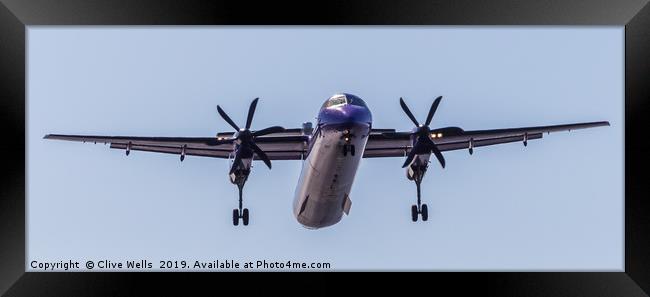 De Havilland Canada DHC-8-400 seen coming in to Ca Framed Print by Clive Wells
